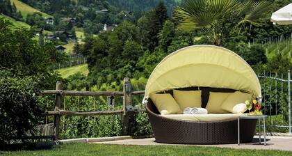 Ferienwohnung "Alpenhof Lodge Almrose" mit Bergblick, Pool & Sauna