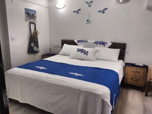 Minibar, desk, laptop workspace, blackout curtains