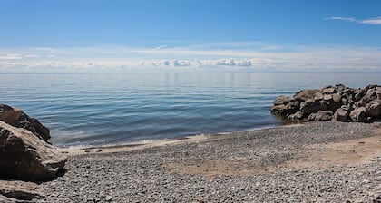 Lake Front Retreat with boat access and private beach