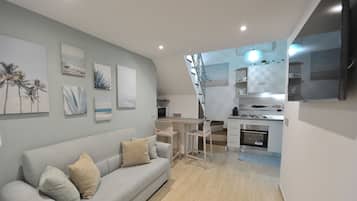 Comfort-studio | Oleskelualue | Taulutelevisio