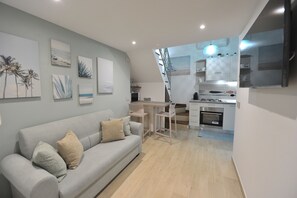 Comfort studio | Woonruimte | Flatscreentelevisie