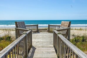 On the beach, sun-loungers