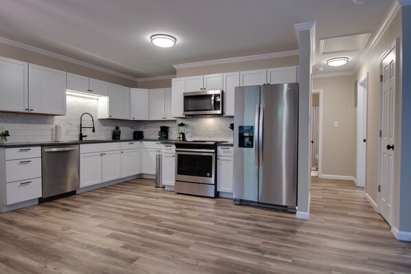 Fridge, microwave, dishwasher, coffee/tea maker