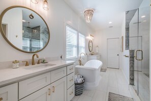 Bathtub, hair dryer, towels