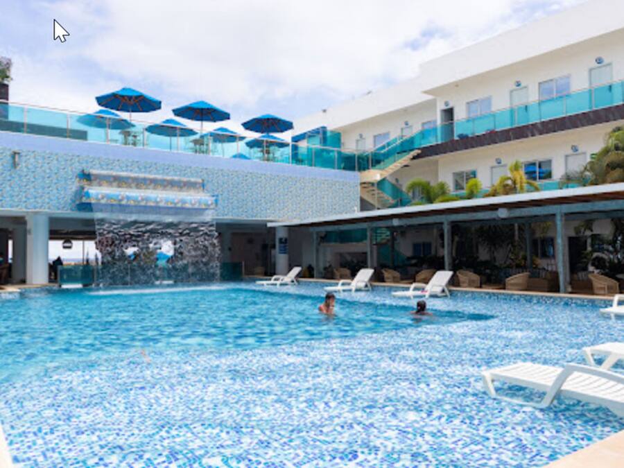 2 outdoor pools, open 7:00 AM to 9:30 PM, pool umbrellas