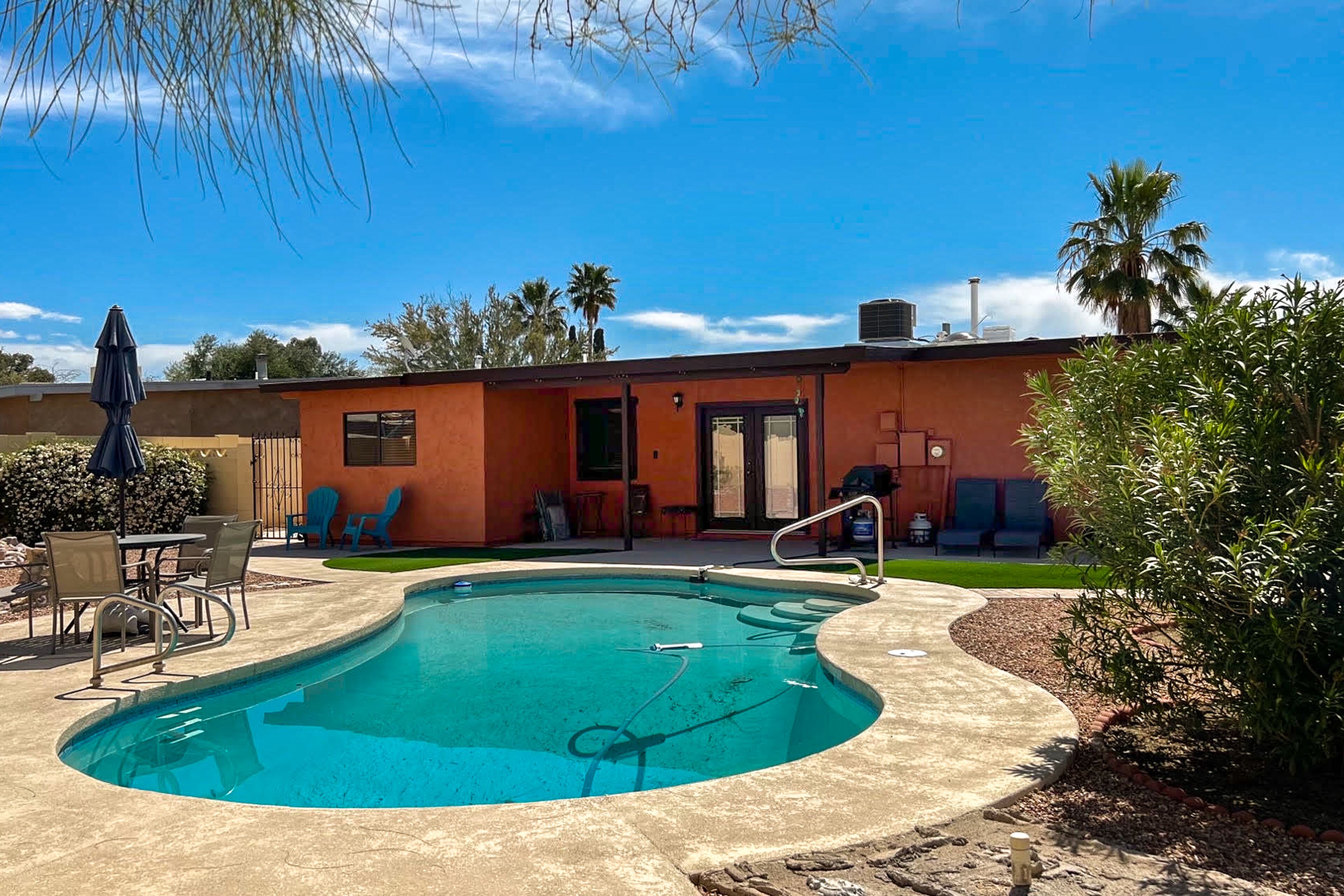 Single-level home with private pool, patio, central AC, & WiFi - 2 dogs welcome