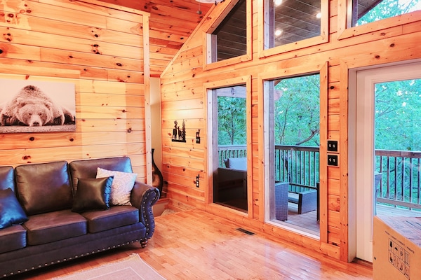 Living Room with View of Outside Deck and Balcony