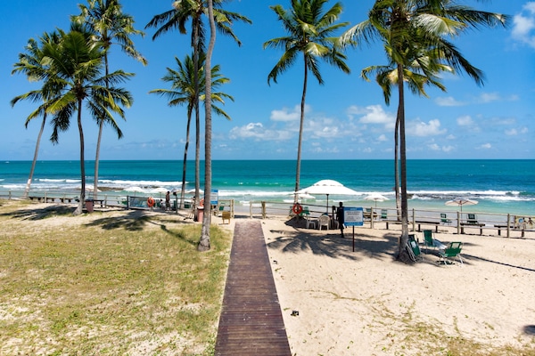 On the beach, white sand