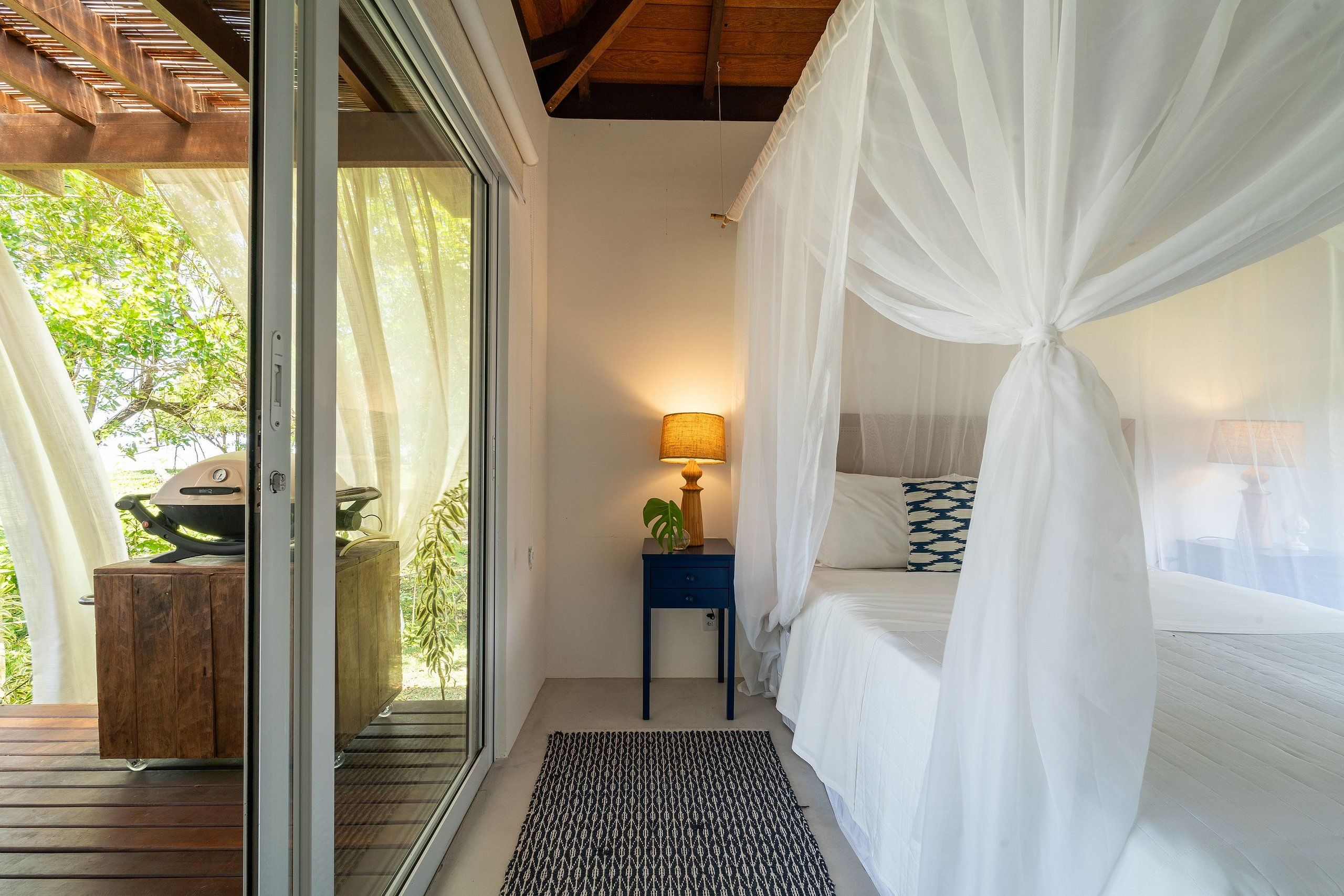 Casa Axé | Cofres nos quartos, cortinas blackout, ferros/tábuas de passar roupa