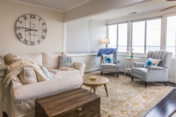 Living room with waterfront views