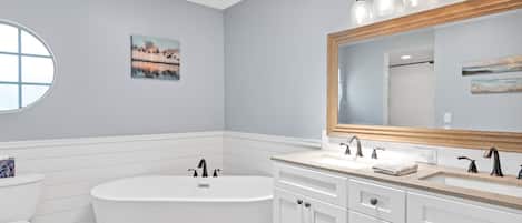 Combined shower/tub, hair dryer, towels, soap
