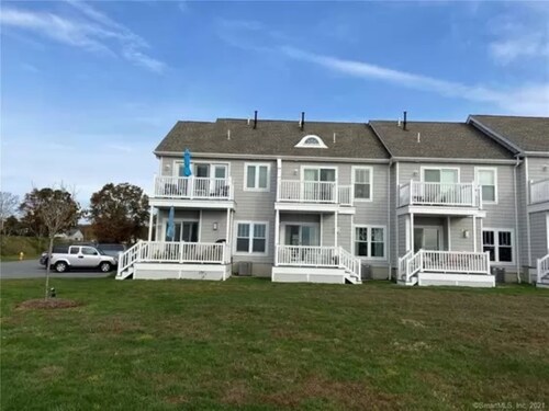 Walk to Beach, pool, tennis court and kids playscape.