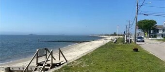 Walk to Beach, pool, tennis court and kids playscape.