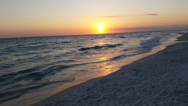 A beach with waves and a sunset. - A Wave From it All:  Condo on the Beach (Gulf Shores)