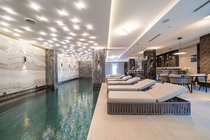 Indoor pool, sun loungers
