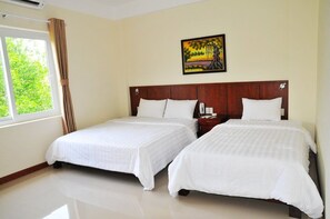 Family Triple Room, 1 Bedroom, Non Smoking | Desk, laptop workspace, free WiFi - Rose Garden (Phu Quoc)