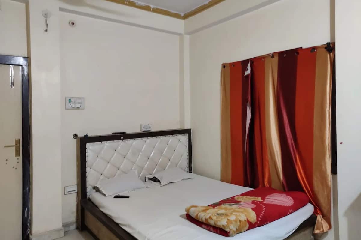 Chambre Double Deluxe, plusieurs chambres, non-fumeurs, vue ville | Wi-Fi gratuit, draps fournis