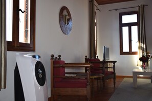 Traditional Apartment | Living area | 32-inch flat-screen TV with digital channels, TV - Pasha's Sarai (Chania)