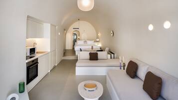 A modern interior with a kitchen, dining area, and living space.