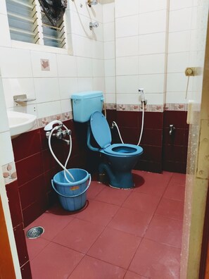 Habitación Deluxe | Baño | Ducha y toallas