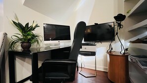Work in comfort with a desk, computer, and office chair.