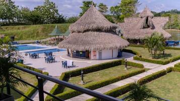 2 outdoor pools, open 7:00 AM to 11:00 PM, free cabanas, pool umbrellas