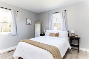 4 bedrooms, memory-foam beds, iron/ironing board, travel cot