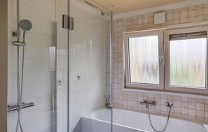 Combined shower/tub