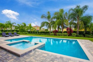 A heated pool - Stylish Family Home Private Pool/Spa | 10min to Disneyworld | Sleeps 22 | EN101 (Kissimmee)