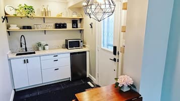 Microwave, stovetop, coffee/tea maker, electric kettle