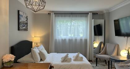 Stylish Main Level Suite with Separate Entrance, Private Patio and 2 Car Parking