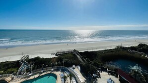 A resort with a pool, beach access, and a pier. - Oceanfront 3 Bedroom/2Bath SeaWatch Resort (Myrtle Beach)