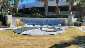 A sign for SeaWatch Resort with a private property notice and a security monitoring sign. - Oceanfront 3 Bedroom/2Bath SeaWatch Resort (Myrtle Beach)