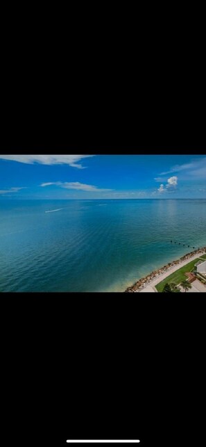 On the beach, sun loungers, beach towels