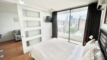 Departamento básico | Tabla de planchar con plancha, wifi gratis y ropa de cama