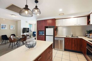 Fridge, microwave, stovetop, dishwasher - 2172 Chevron 17th Floor Beach Views (Surfers Paradise)