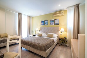 Comfort Quadruple Room, Partial Sea View | Beach/ocean view