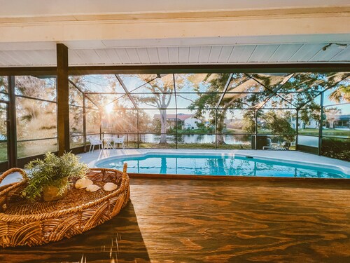 Serene Waterfront Home with Pool. Minutes to Sanibel & Fort Myers Beach.