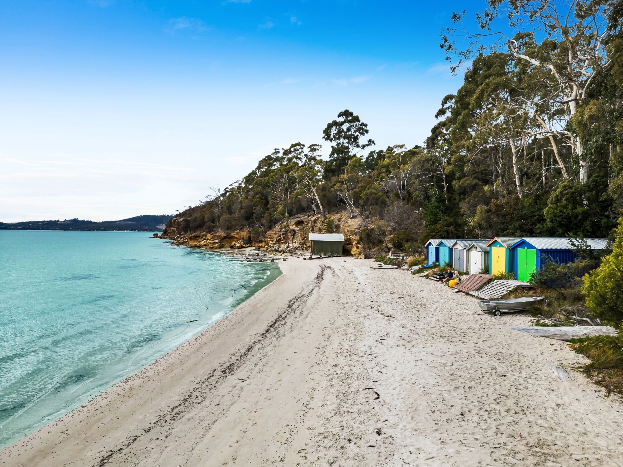 Nära stranden, solstolar och strandhanddukar