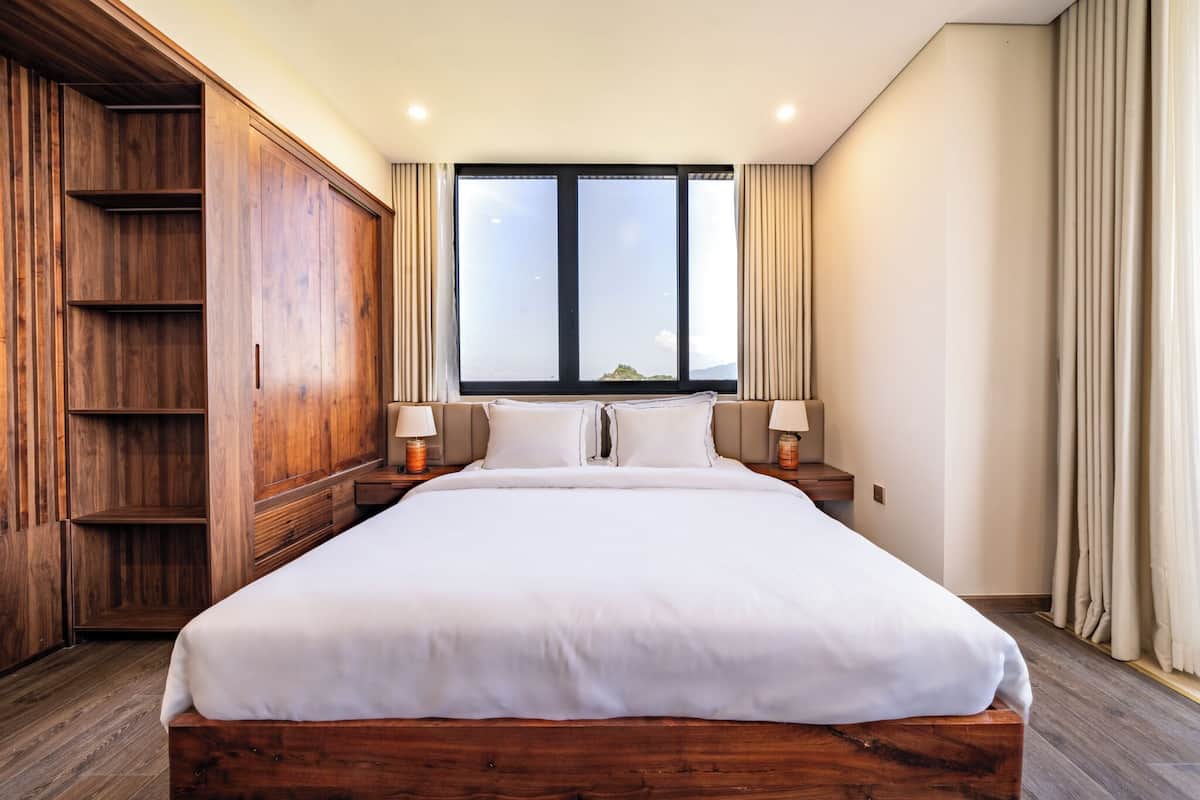 Frette Italian sheets, premium bedding, desk, laptop workspace