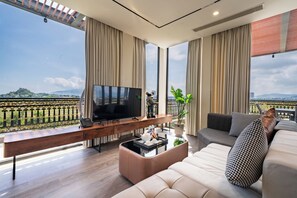 Sky Terrace 2-Bedroom Penthouse | Living room | LED TV - Cami Riverside Resort Đà Nẵng (Da Nang)