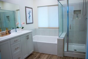 Bathtub, hair dryer, towels