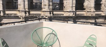 Opposite Les Arenes and La Major