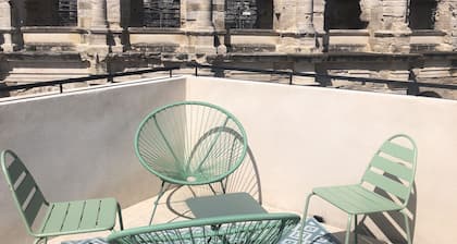Opposite Les Arenes and La Major