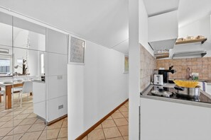Familie penthouse, meerdere slaapkamers, aan het strand (Rooftop On Stresa Lake View) | Interieur