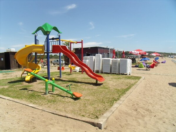 A playground with slides and climbing structures. - Popular 2 bed Apart Home in Central Side With Many on Site Amenities Facilities (Manavgat)