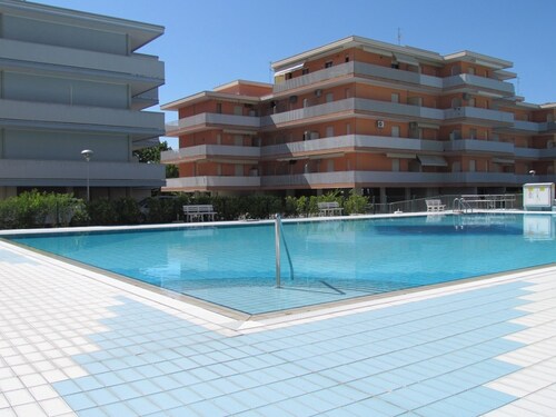 Enjoy a Lovely Flat With Pool