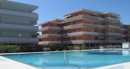 Enjoy a Lovely Flat With Pool