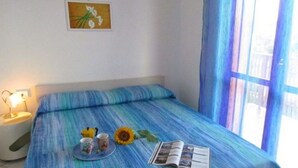 Room - Cozy Flat for Families in Residence With 12 Pools - Tennis- Children's Play Area (San Michele al Tagliamento)