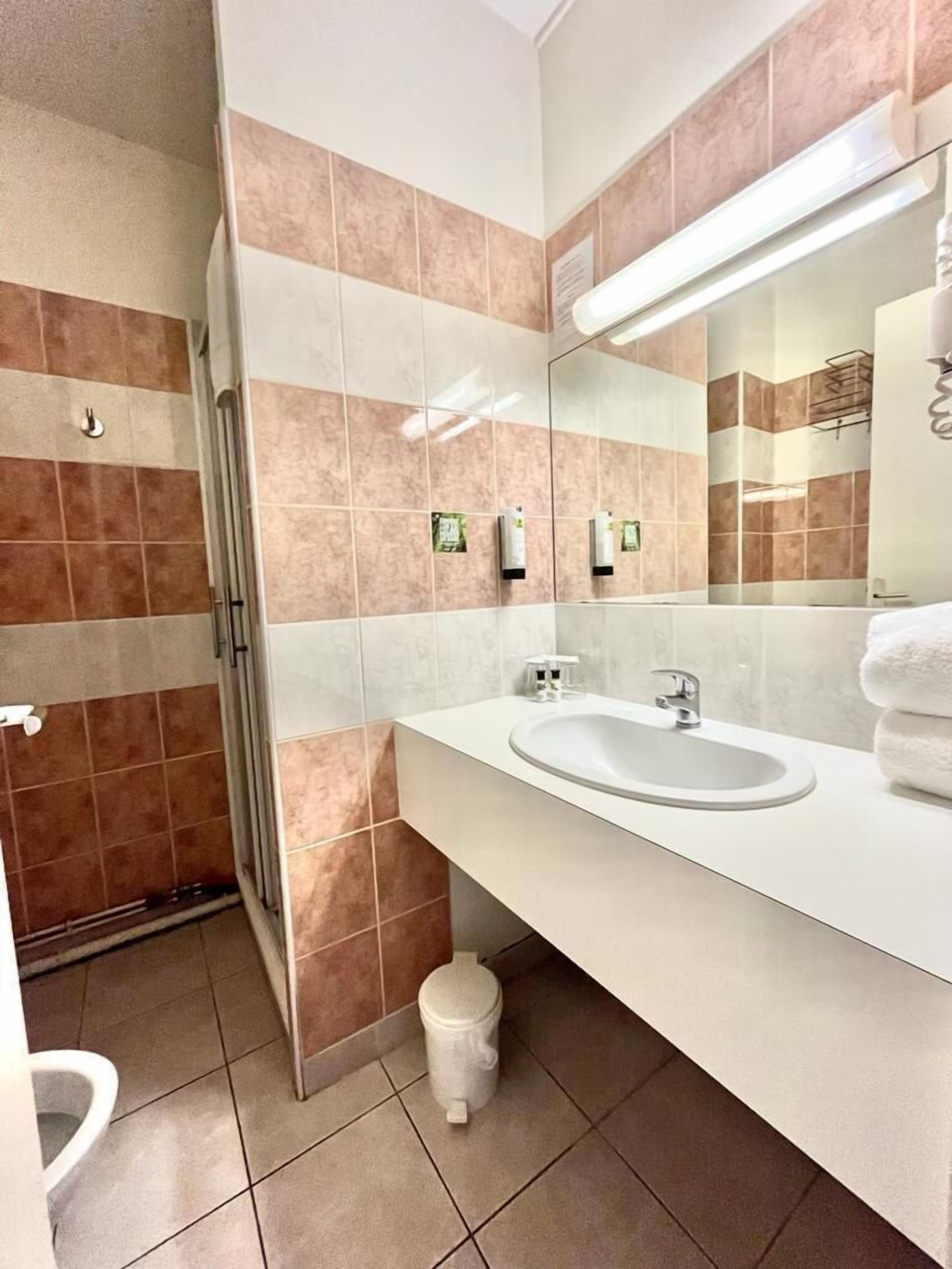 comfort room | bathroom | free toiletries, hair dryer, towels, soap